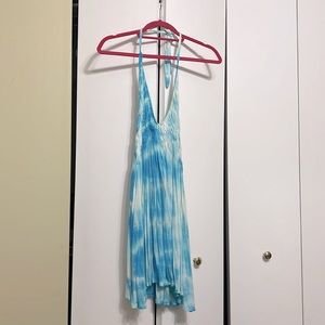 Boy and white flowy summer top with tie straps